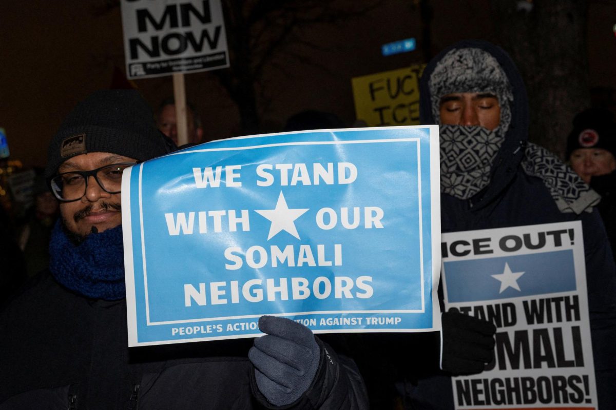 Demonstrators rally in protest against Immigration and Customs Enforcement (ICE), amid a reported federal immigration operation targeting the Somali community, in Minneapolis, Minnesota, U.S. December 8, 2025.  REUTERS/Tim Evans