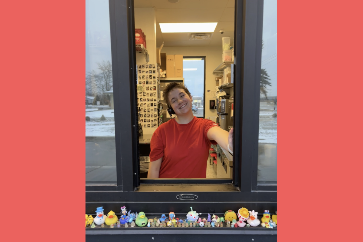 Aubrey greets the customers at the window with a very enthusiastic tone! (Photo used with permission by Aubrey Loberg.)