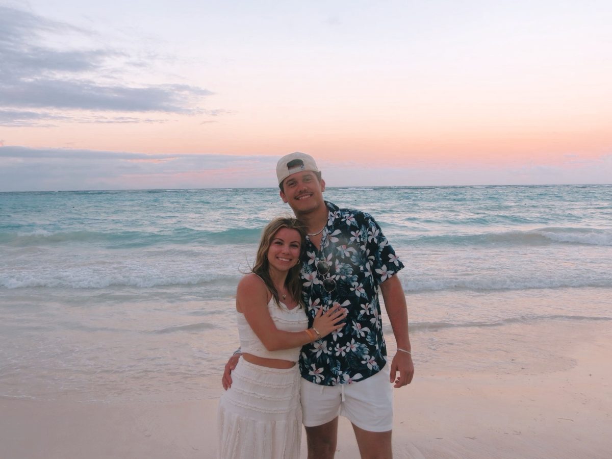 Alex Bird and I on the beach posed for the pretty sunset background 